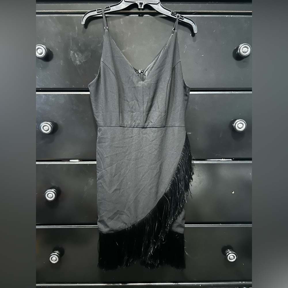 Black cocktail dress with tassel bottom
